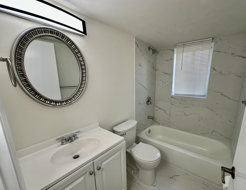 Fully Remodeled 2/2 Corner Unit in Margate! Step into this - photo 8