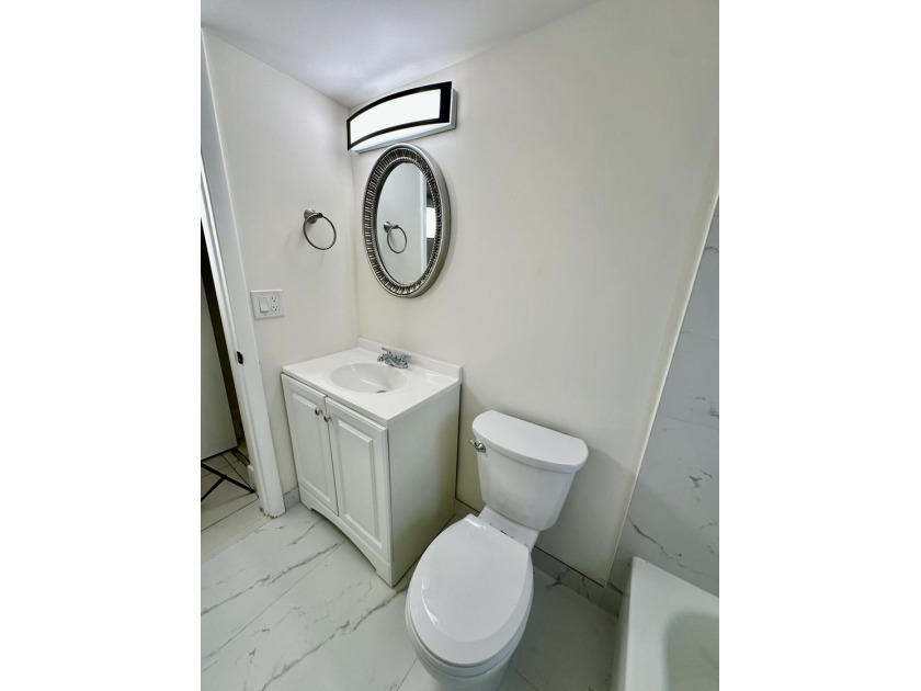 Fully Remodeled 2/2 Corner Unit in Margate! Step into this - photo 10