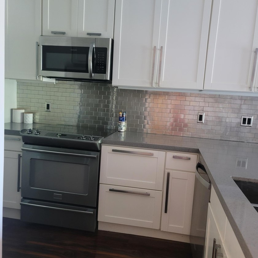Nice condo priced to sell,below comps. Beautifully remodeled - photo 18