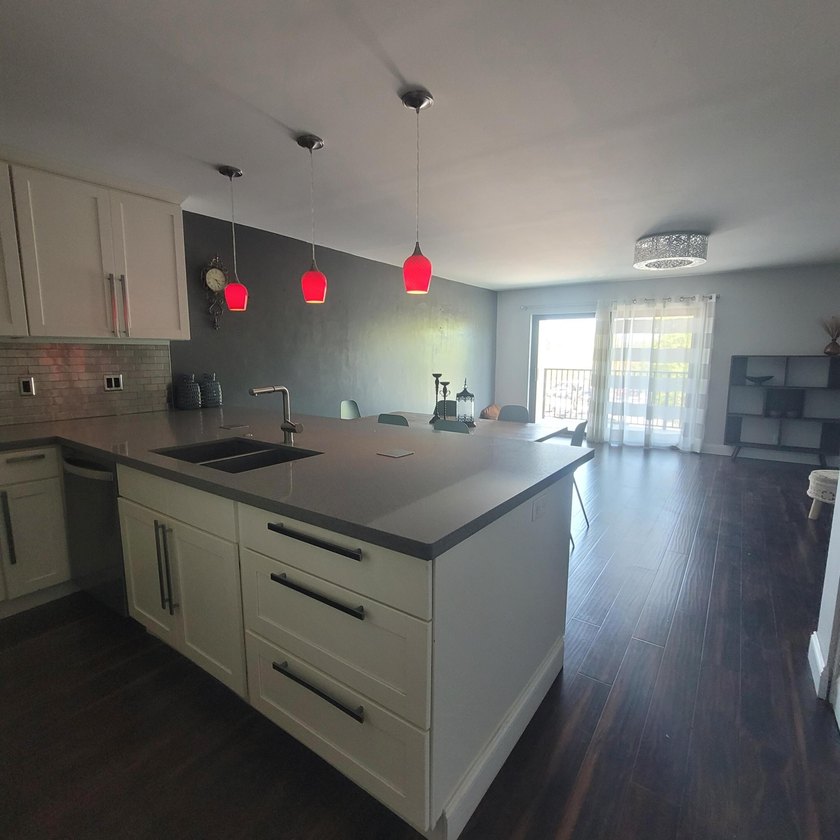 Nice condo priced to sell,below comps. Beautifully remodeled - photo 19