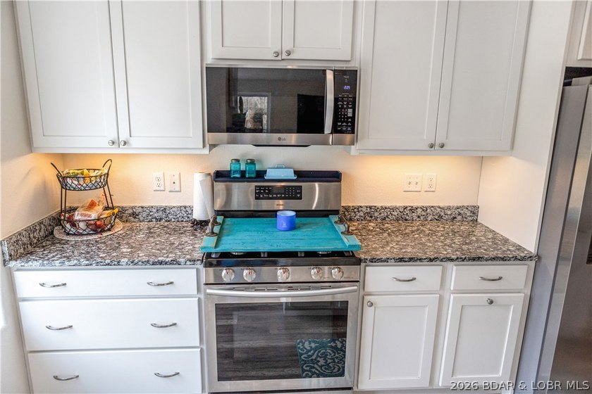 Situated on 4.43 acres just minutes from Camdenton, this - photo 11