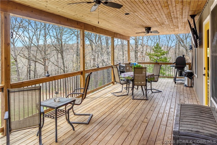 Situated on 4.43 acres just minutes from Camdenton, this - photo 29