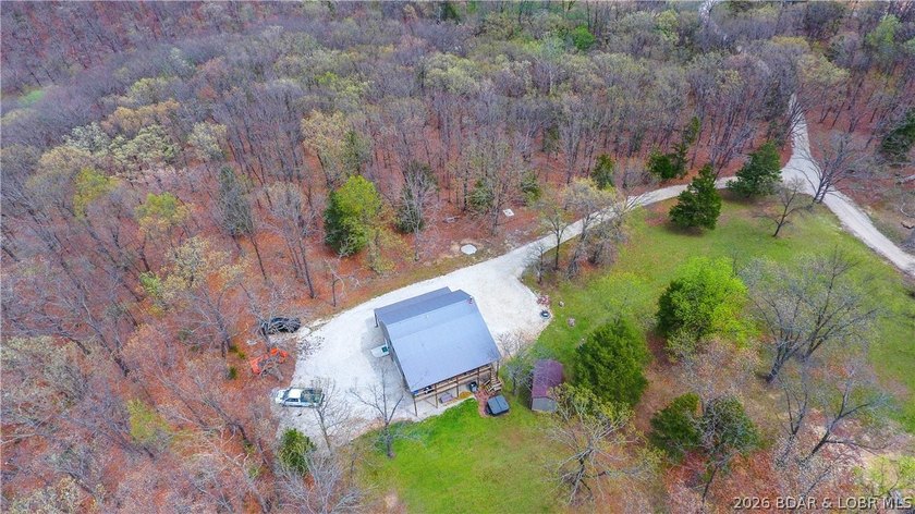 Situated on 4.43 acres just minutes from Camdenton, this - photo 31