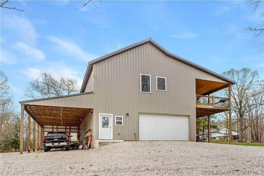 Situated on 4.43 acres just minutes from Camdenton, this - photo 32