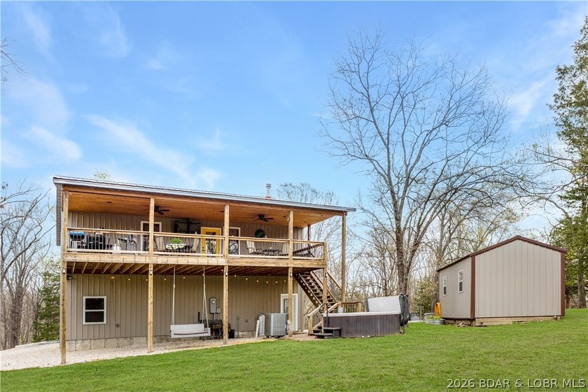 Situated on 4.43 acres just minutes from Camdenton, this - photo 33