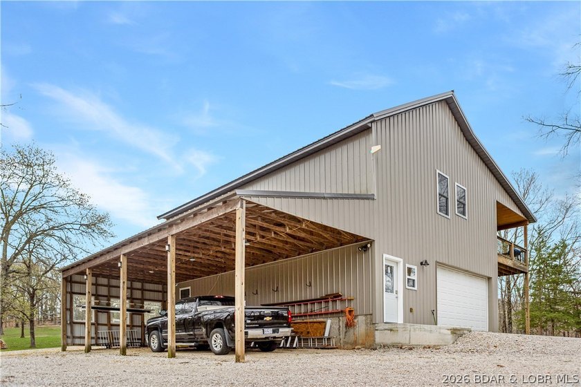 Situated on 4.43 acres just minutes from Camdenton, this - photo 35