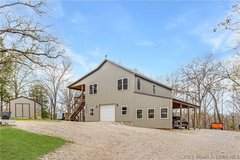 Situated on 4.43 acres just minutes from Camdenton, this - photo 36