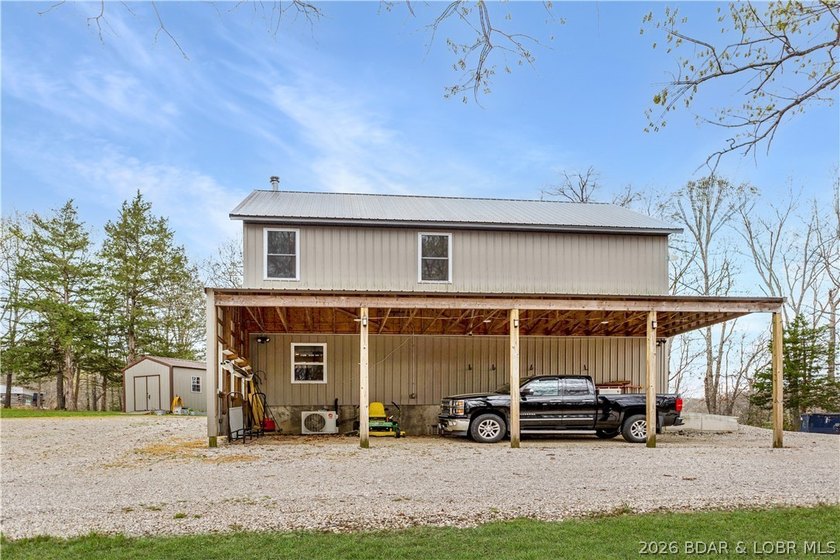 Situated on 4.43 acres just minutes from Camdenton, this - photo 37