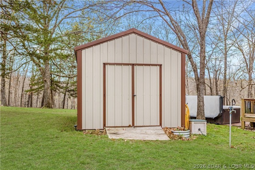 Situated on 4.43 acres just minutes from Camdenton, this - photo 38