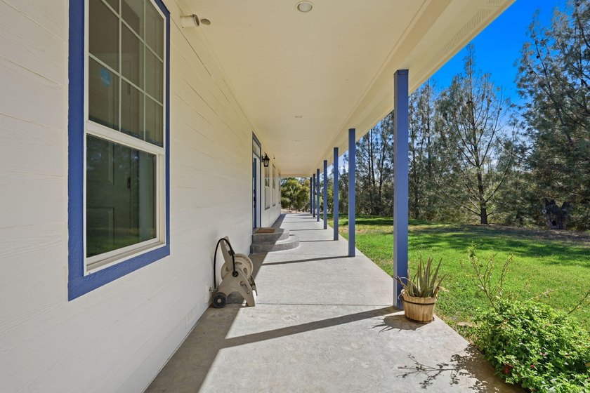 Gorgeous custom farmhouse situated on 5 acres, offering 3 - photo 3