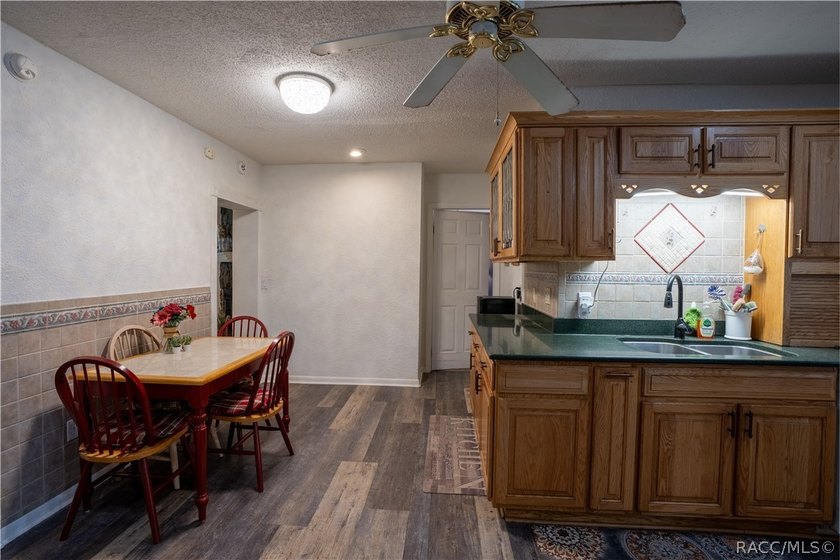 Beautifully maintained 4-bedroom, 2-bath pool home in the - photo 11
