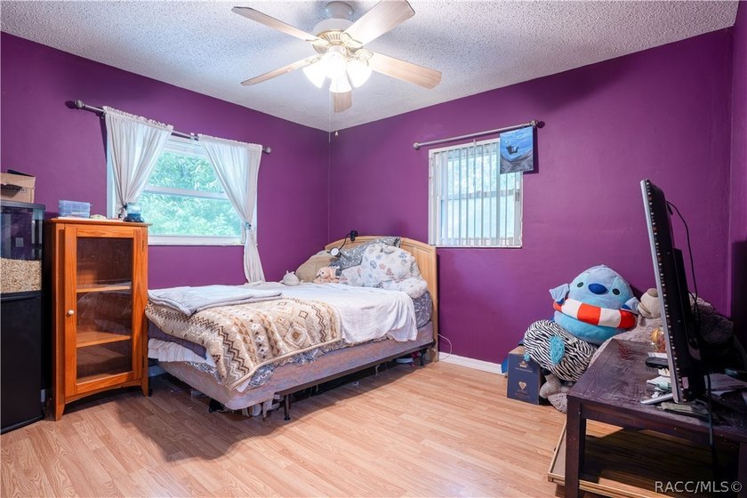 Beautifully maintained 4-bedroom, 2-bath pool home in the - photo 14