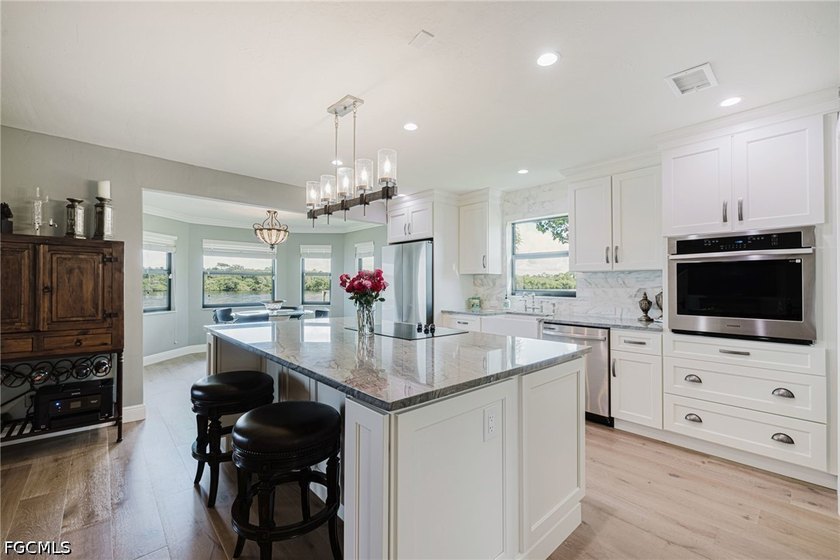 Welcome home to this furnished elevated home only steps from the - photo 12