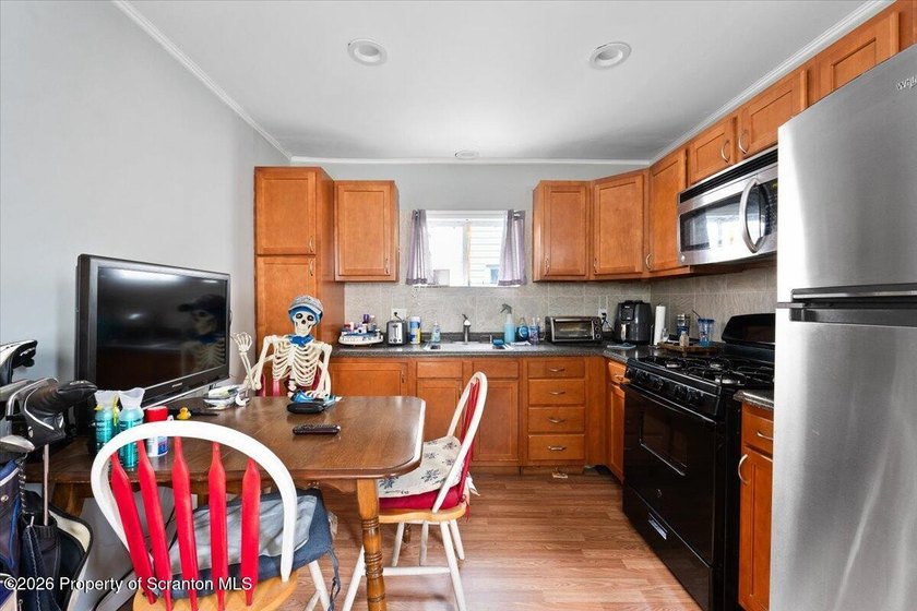 Welcome to 74. W Carey Street, Wilkes-Barre! This charming and - photo 4