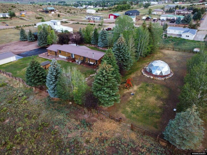 Minutes from Flaming Gorge, this exceptional 2.2-acre property - photo 2
