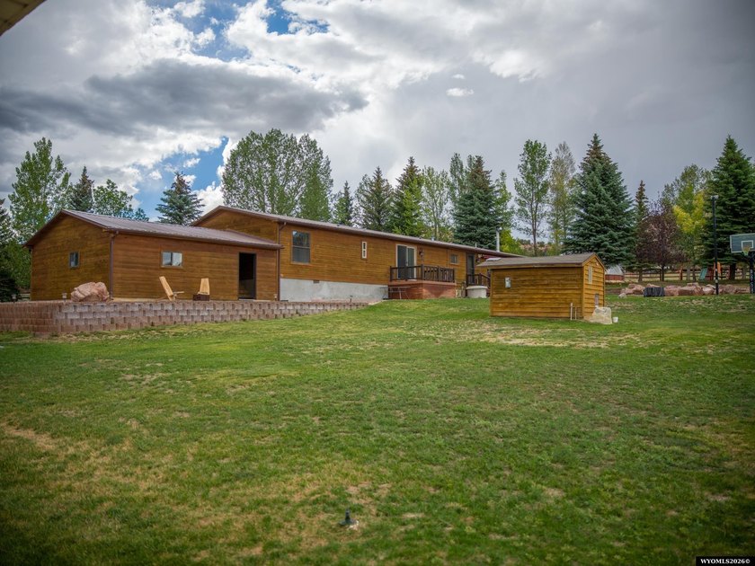 Minutes from Flaming Gorge, this exceptional 2.2-acre property - photo 9