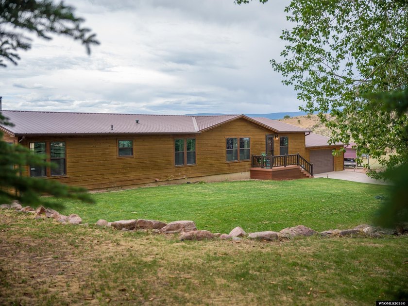 Minutes from Flaming Gorge, this exceptional 2.2-acre property - photo 10