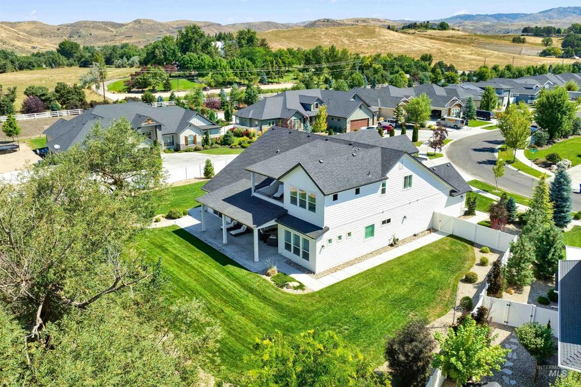 Custom-built on a rare HALF ACRE backing to open space with no - photo 18