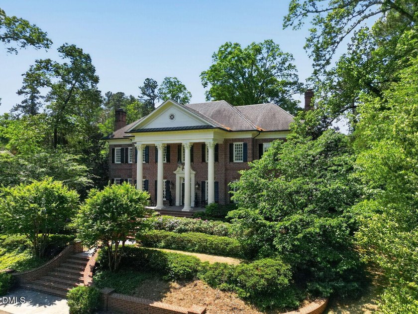 Stately, elegant brick estate set on a 1.57-acre lot along - photo 3