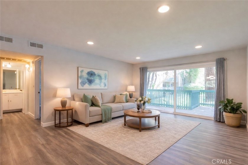Positioned within the lush, gated enclave of Stoneybrook Villas - photo 5