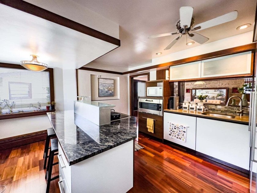 Welcome to this exceptional 3-bed, 3-bath ranch inspired by - photo 7