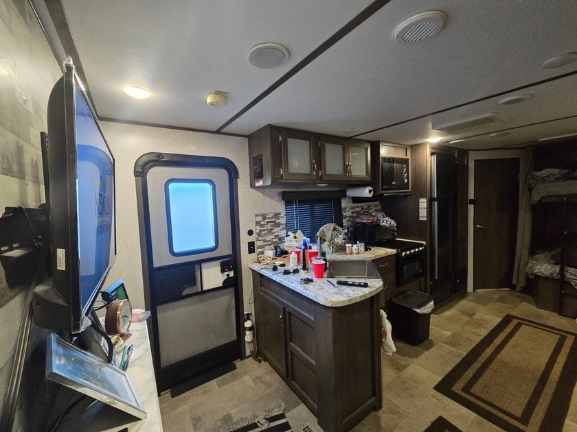 Motivated Seller! Charming 2-bedroom, 1-bath camper with a large - photo 8