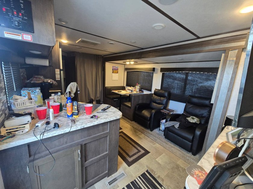 Motivated Seller! Charming 2-bedroom, 1-bath camper with a large - photo 9