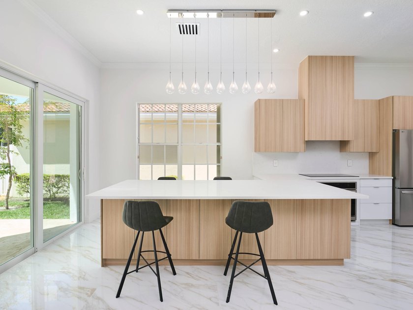 This completely reimagined 3-bedroom, 2-bath residence offers a - photo 7