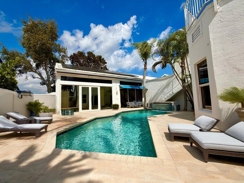 Beautifully designed residence featuring three distinct living - photo 5
