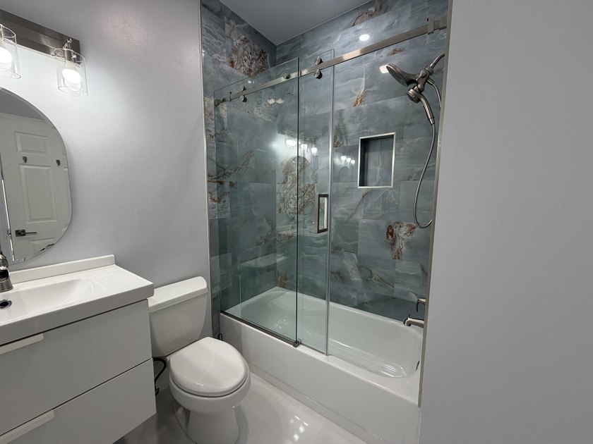 Beautifully designed residence featuring three distinct living - photo 8