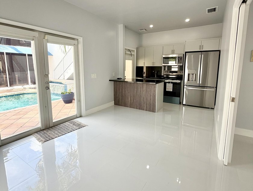 Beautifully designed residence featuring three distinct living - photo 9