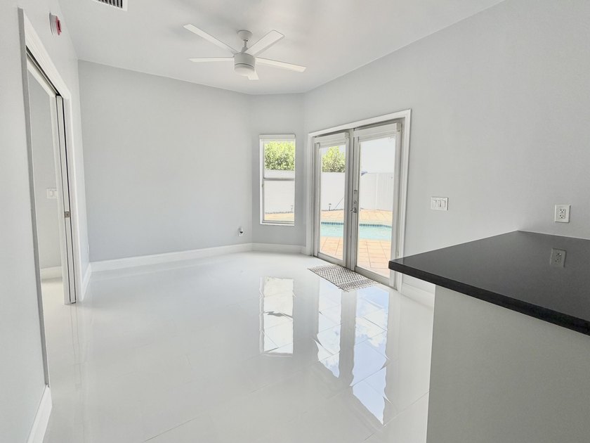 Beautifully designed residence featuring three distinct living - photo 10