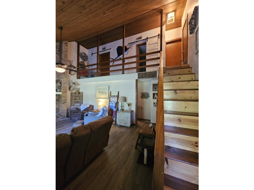 Tucked away in the gated community of Holly Lake Ranch, this - photo 8