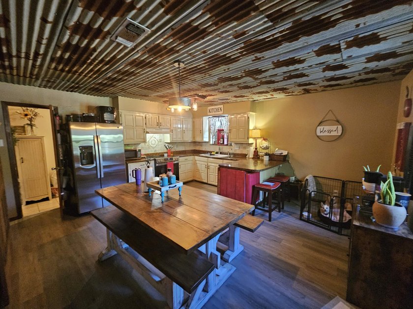 Tucked away in the gated community of Holly Lake Ranch, this - photo 10