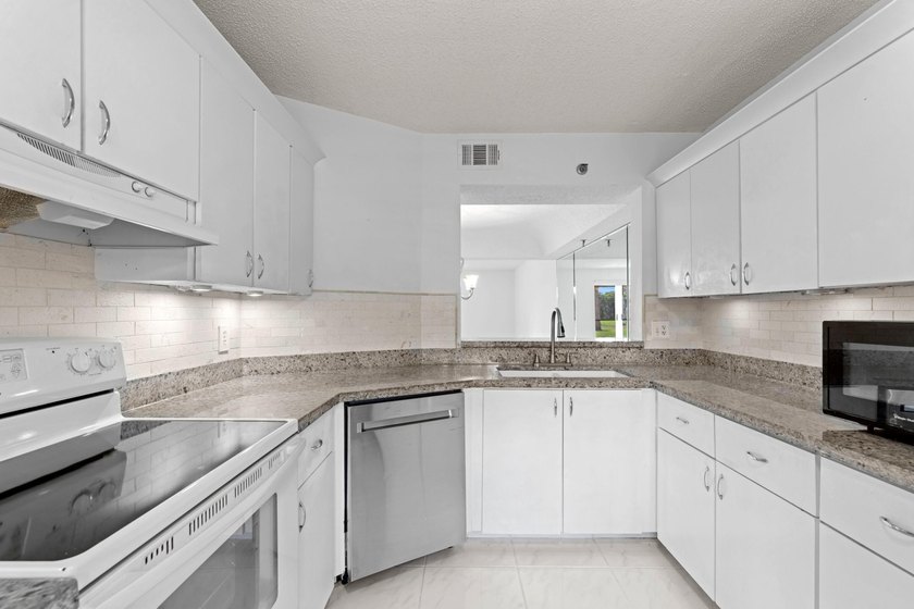 GORGEOUS FULLY 1ST FLOOR CONDO | PRESTIGIOUS 55+ COMMUNITY OF - photo 8
