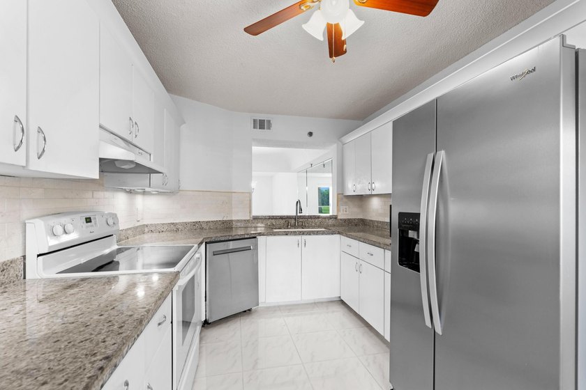 GORGEOUS FULLY 1ST FLOOR CONDO | PRESTIGIOUS 55+ COMMUNITY OF - photo 9