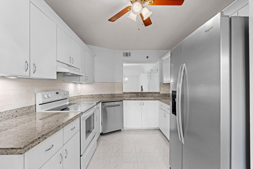 GORGEOUS FULLY 1ST FLOOR CONDO | PRESTIGIOUS 55+ COMMUNITY OF - photo 10