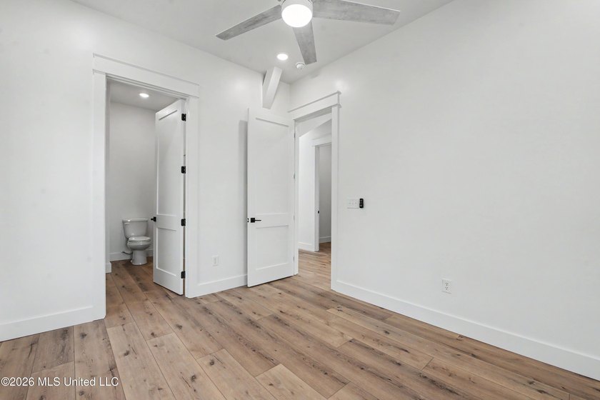 Enjoy coastal living on the beautiful Biloxi Back Bay in this - photo 11