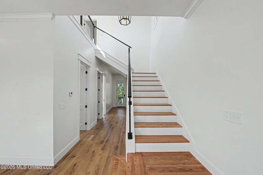 Enjoy coastal living on the beautiful Biloxi Back Bay in this - photo 16