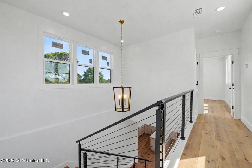 Enjoy coastal living on the beautiful Biloxi Back Bay in this - photo 17
