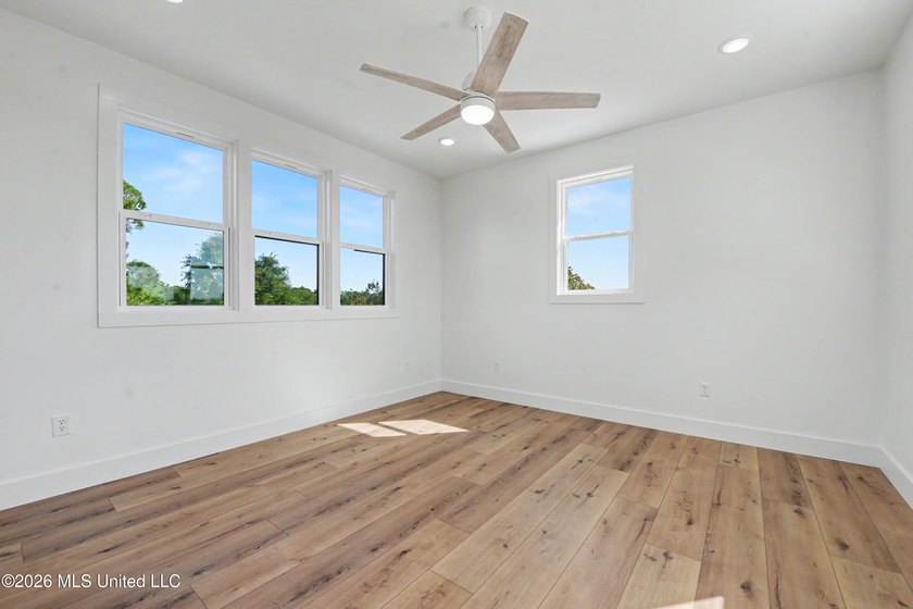 Enjoy coastal living on the beautiful Biloxi Back Bay in this - photo 18