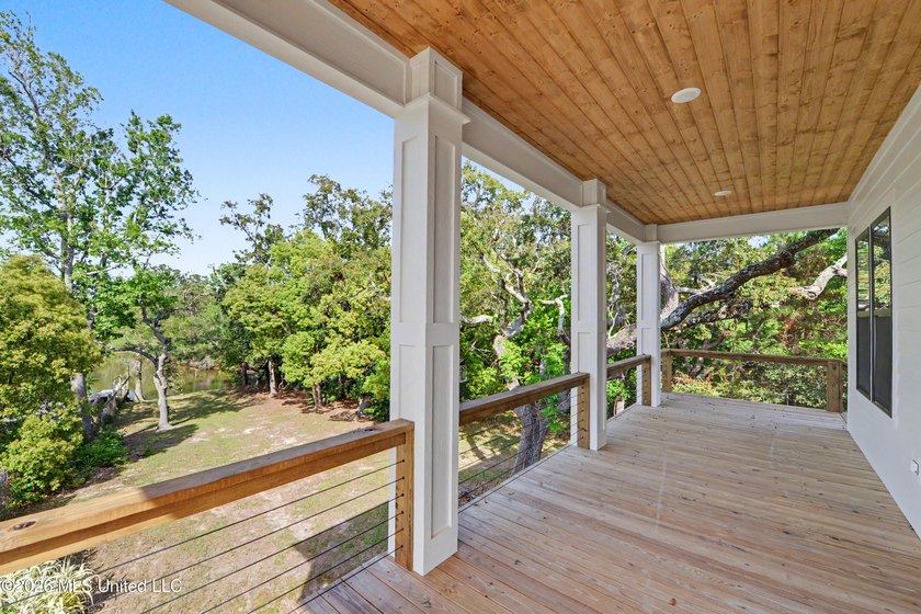 Enjoy coastal living on the beautiful Biloxi Back Bay in this - photo 22
