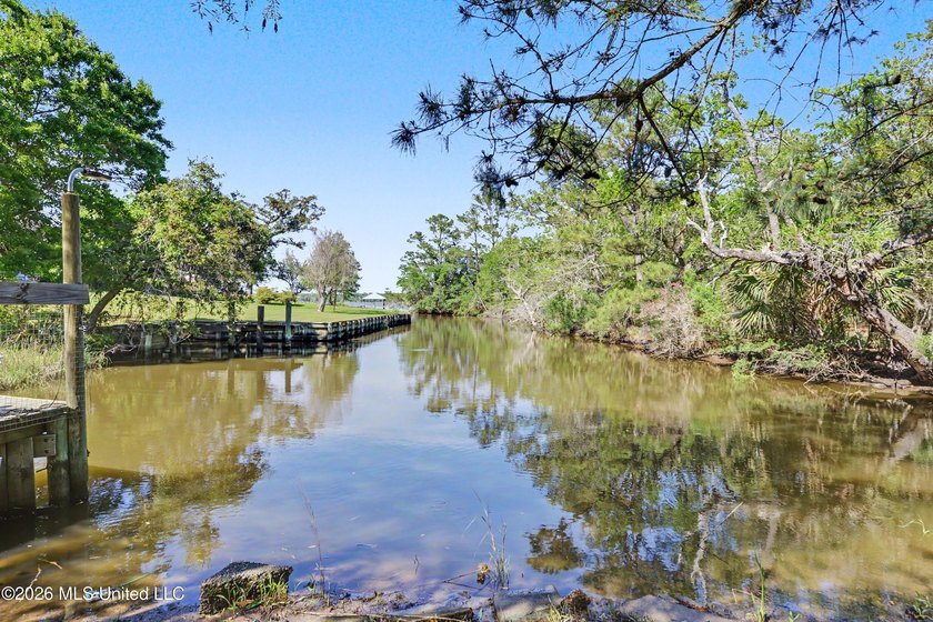 Enjoy coastal living on the beautiful Biloxi Back Bay in this - photo 24