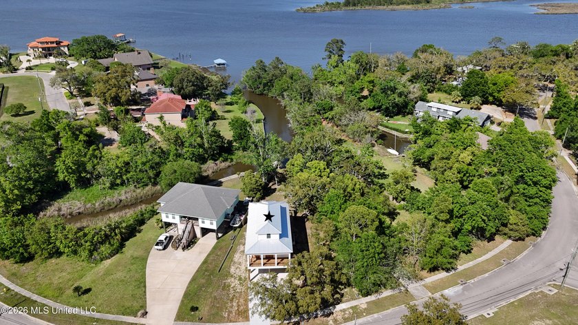 Enjoy coastal living on the beautiful Biloxi Back Bay in this - photo 25