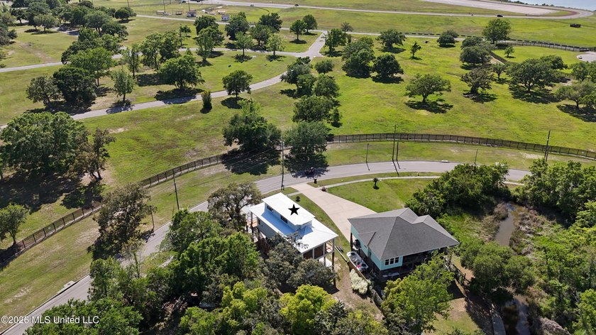 Enjoy coastal living on the beautiful Biloxi Back Bay in this - photo 30