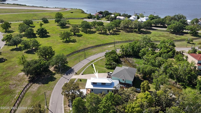 Enjoy coastal living on the beautiful Biloxi Back Bay in this - photo 31