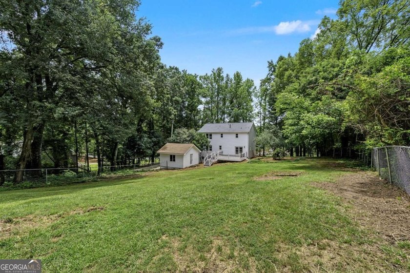 Experience the freedom of NO HOA living on over an acre just - photo 48
