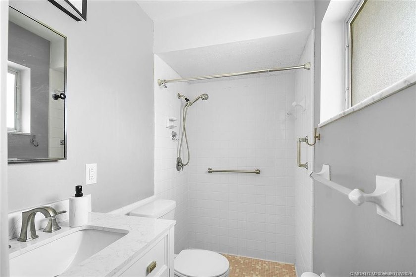 Mid-century modern charm abounds in this CBS home that features - photo 13