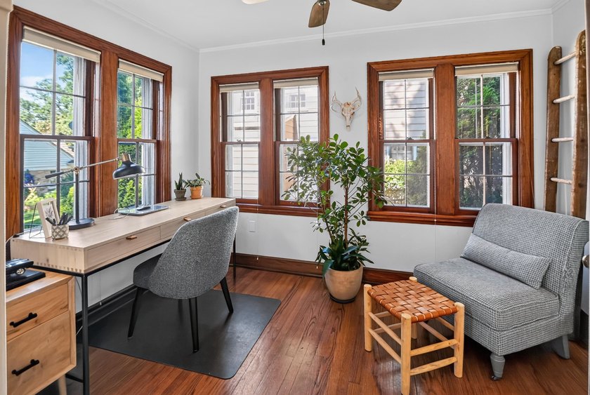 Nestled on a quiet, tree-lined street beneath a canopy of mature - photo 15