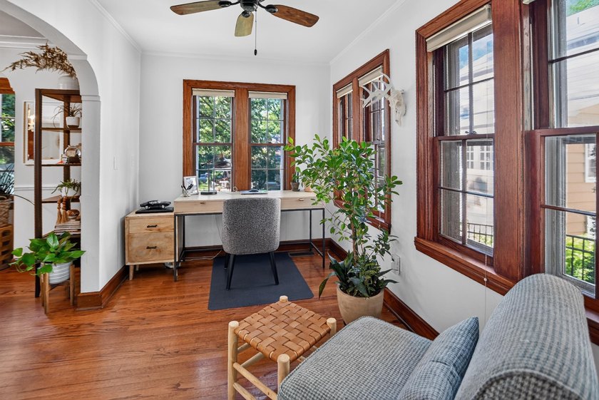 Nestled on a quiet, tree-lined street beneath a canopy of mature - photo 16